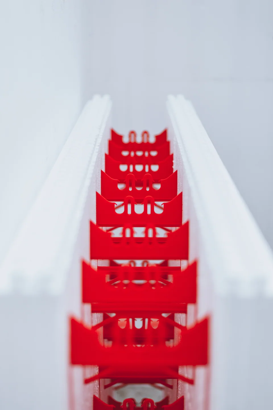 Superform ICF block with white foam forms and red connecting webs